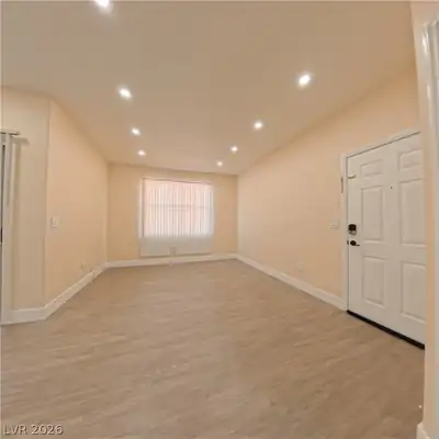 8000 Badura Avenue 1092 Living Room