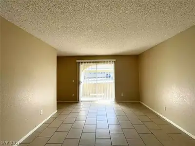5260 Mission Monterey Lane 103 Living Room