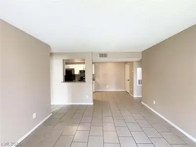 5260 Mission Monterey Lane 103 Living Room