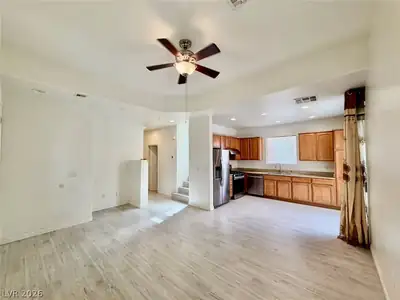 5490 Floating Flower Avenue Living Room