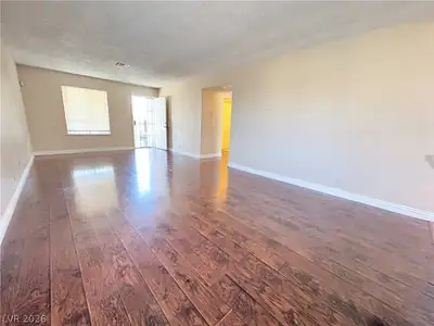 4689 Sand Creek Avenue C Living Room