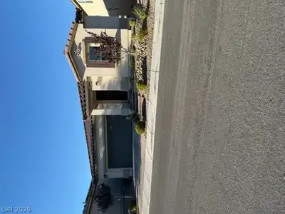 10764 South Canary Blossom Avenue, Las Vegas, NV 89129 Front of Structure